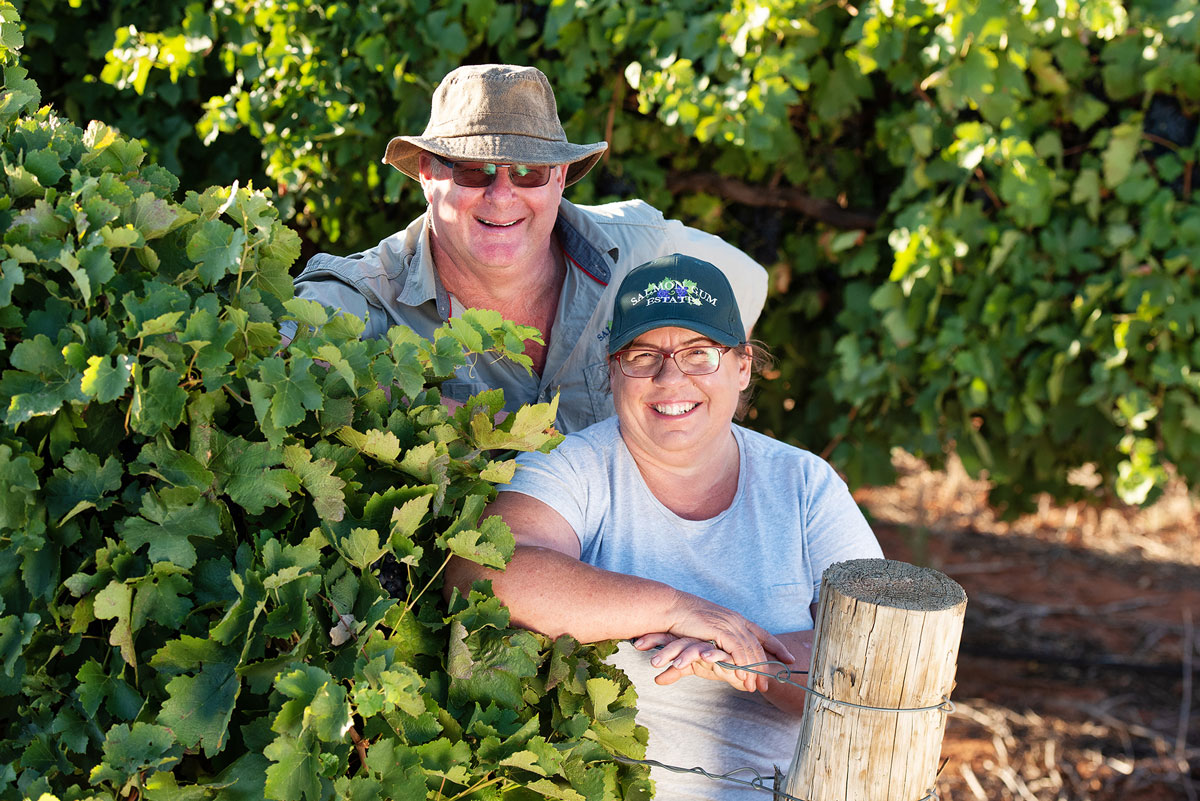 Peter and Jacque Schulz standing in their Murray River vineyard
